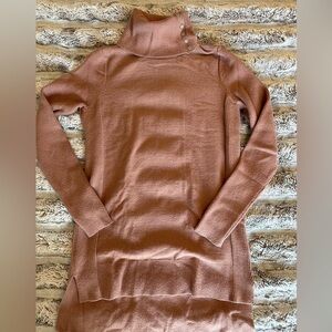 Calvin Klein Jeans S Turtleneck with unique buttons on neck.  Lower back hemline